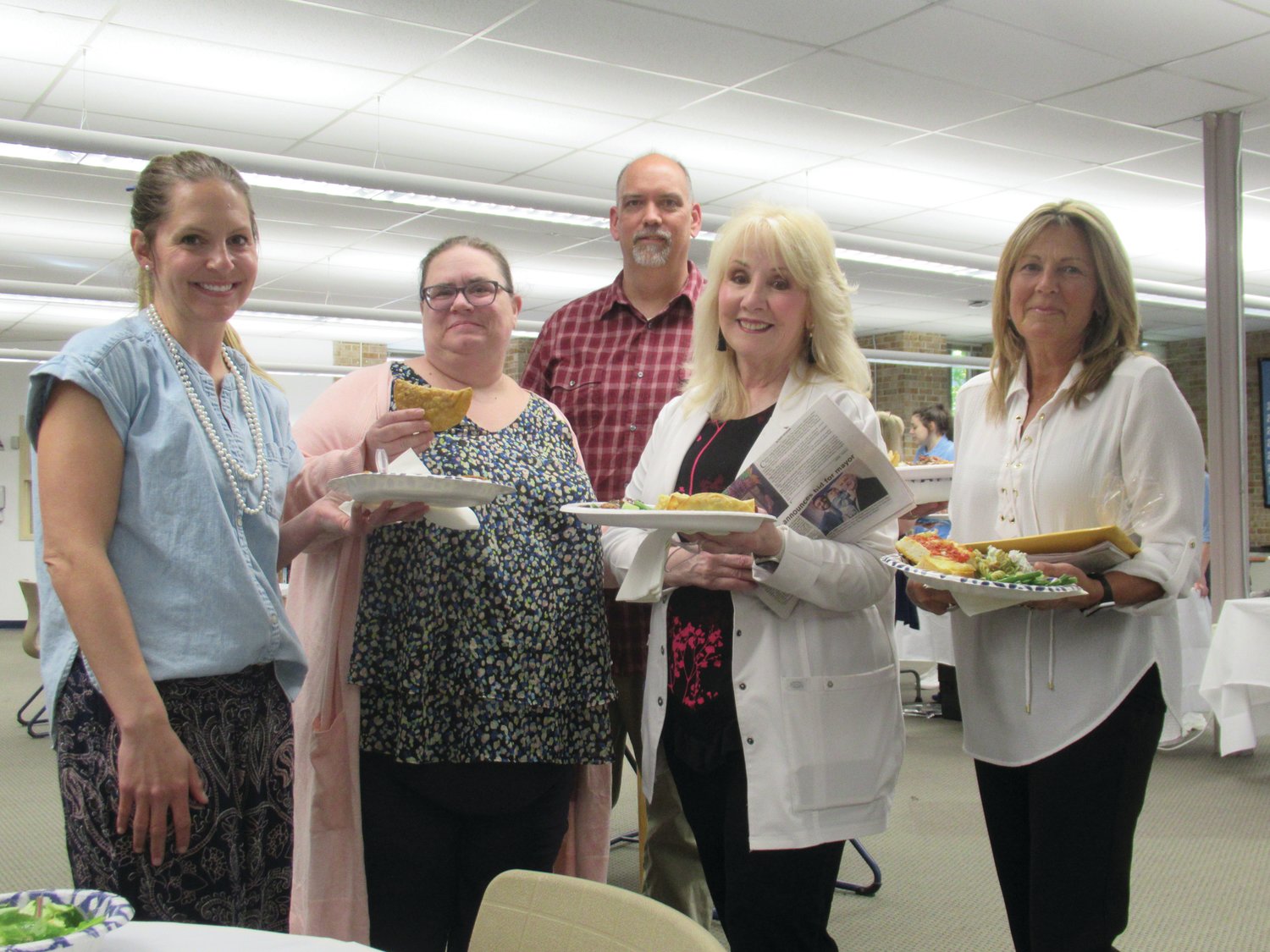 SPECIAL SERVINGS: JHS faculty members Terri Florio, Kassie Kerms, Tim Stahl, Alberta Procaccini and Pat Cardillo show off their plates of “fantastic foods” they enjoyed during last week’s luncheon.